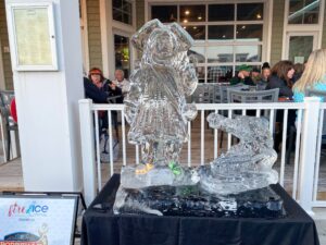 an ice sculpture is displayed on a table