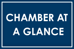 a blue sign with the words chamber at a glance