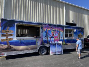 a food truck parked in front of a building