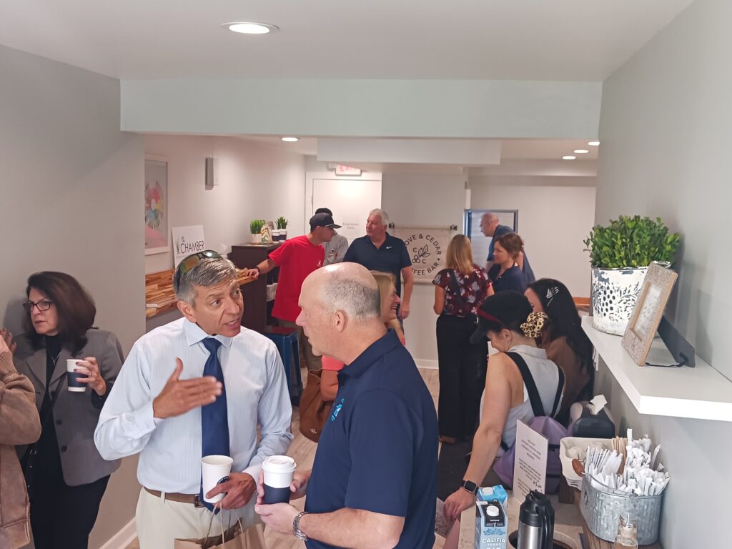 a group of people standing in a room